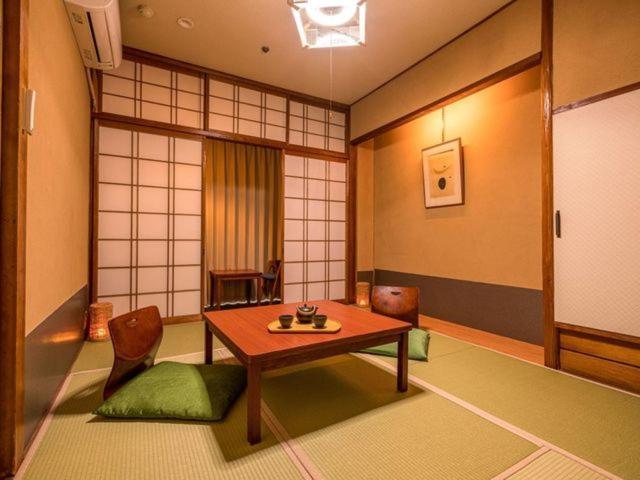 Ooedo Onsen Monogatari Yamashiro Saichoraku Hotell Kaga  Rum bild