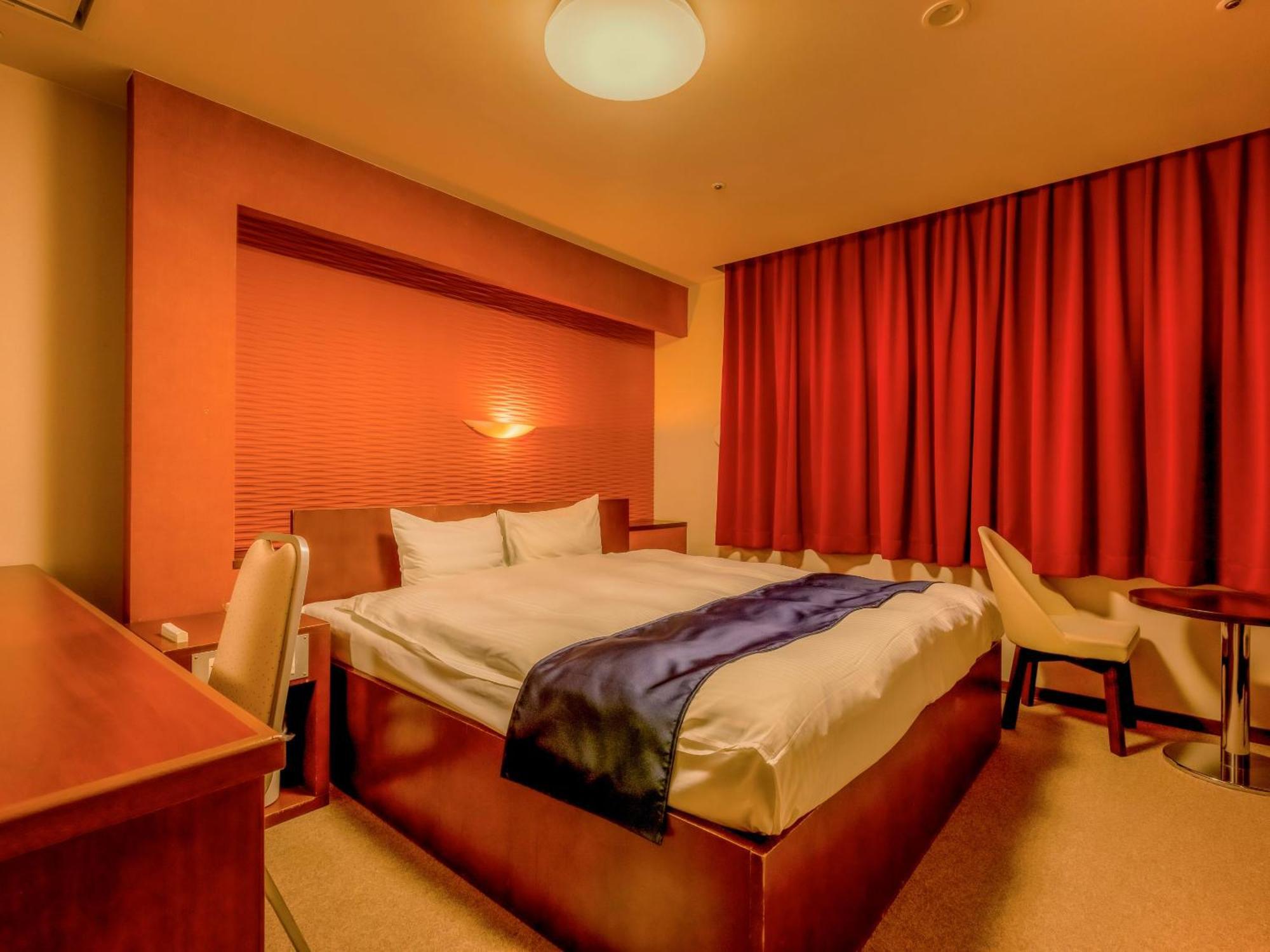 Ooedo Onsen Monogatari Yamashiro Saichoraku Hotell Kaga  Rum bild